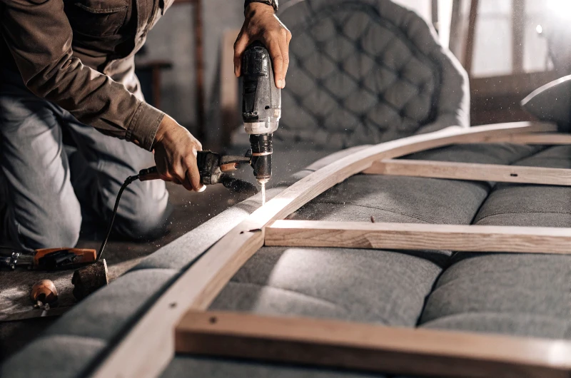 Drilling holes into Ash hardwood durning furniture making.