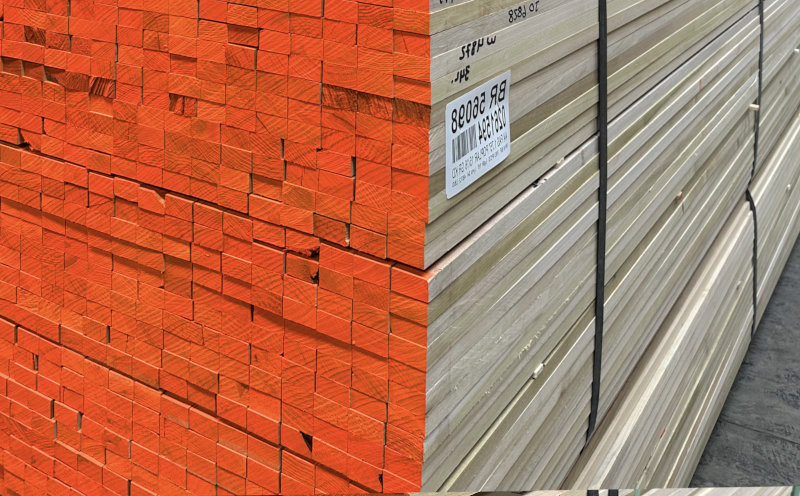 Custom gang ripped lumber stacked in warehouse.