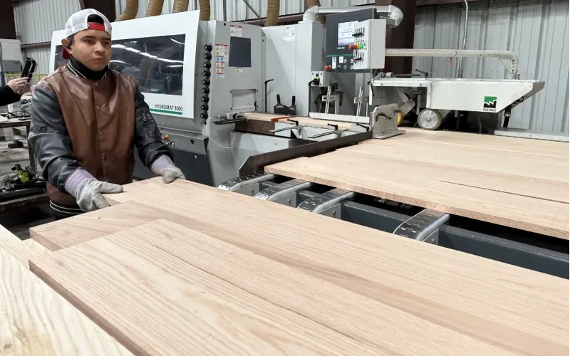 Line 5 moulder showing planing finishing.